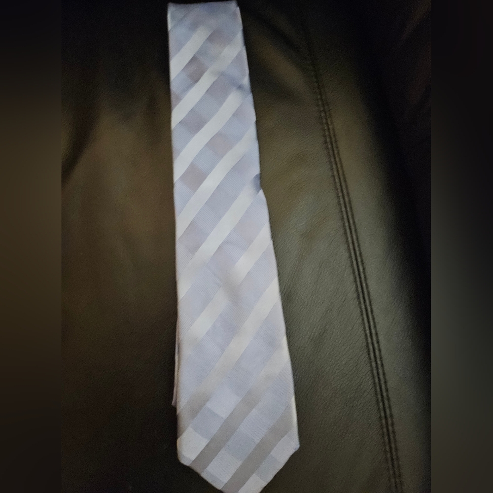 Some designer... logo fell off blue silk tie